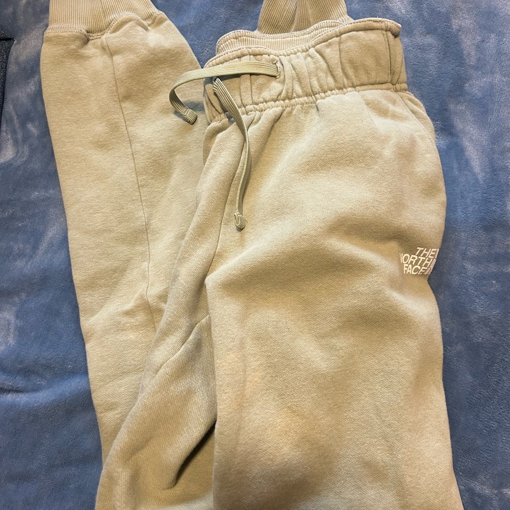 Green Northface sweatpants